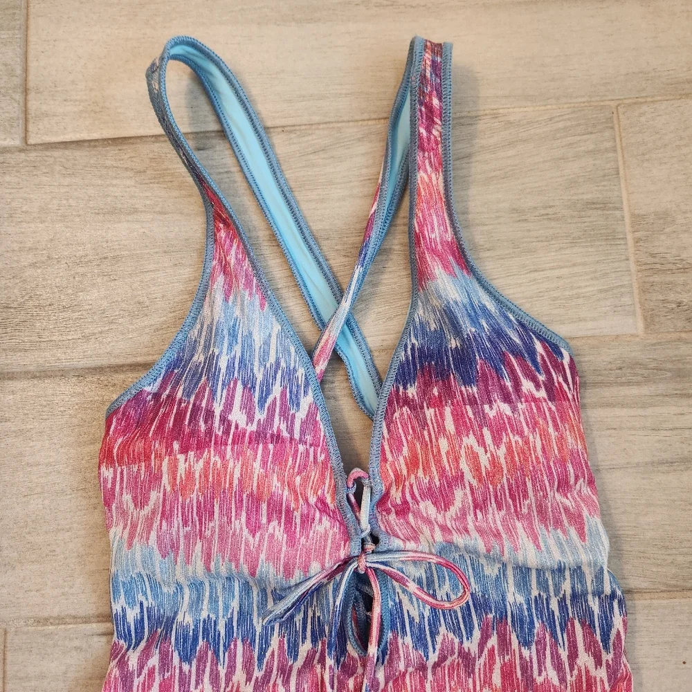 Becca swimsuit L blue pink glitter one piece Joshua Tree plunge deepV new $160
